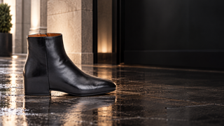 Aquatalia Ulyssa black Nappa ankle boot in a modern rain-ready Milan gallery
