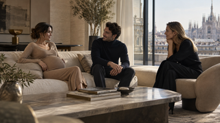 Expectant woman and friends gathered in a contemporary Milan residence.