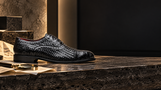 Marco Di Milano John black woven caiman Oxford on a luxury authentication desk
