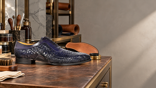 Mezlan S20702 navy woven leather Oxford in a modern shoe repair atelier