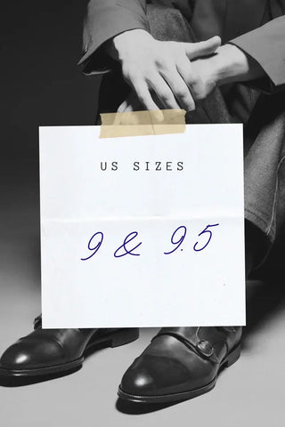 Black leather men's shoes size 9 US and 9.5 US displayed with a sign indicating available sizes.