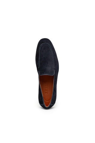 Zelli Italia Bruno navy Italian suede penny loafer with a round toe and tan leather interior.