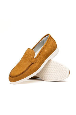Cognac nubuck loafer with embossed crocodile pattern and white rubber sole by Zelli Italia.