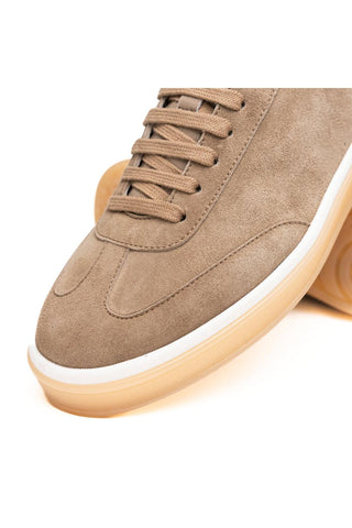Zelli Italia Gotti taupe suede sneaker with matching laces, white midsole, and gum rubber outsole.