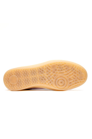 Taupe Zelli Italia Gotti sneaker showing the textured gum rubber outsole with a geometric tread pattern.