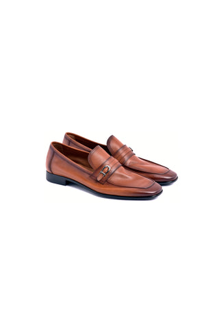 Tan Nappa leather men's loafers featuring a polished side buckle and smooth finish on a white background.
