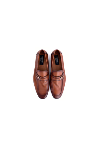Tan Nappa leather loafers featuring a side-buckle detail and smooth finish, viewed from above.