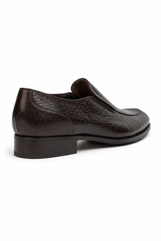 Dark brown Caporicci ostrich and peccary leather slip-on loafer with a stacked heel and Luigi rubber-inlaid sole.
