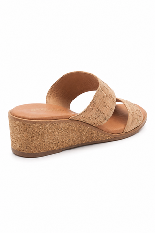 Andre Assous Gwenn women's cork wedge sandals with slip-on design and 1.5-inch heel, featuring genuine cork and rubber sole.