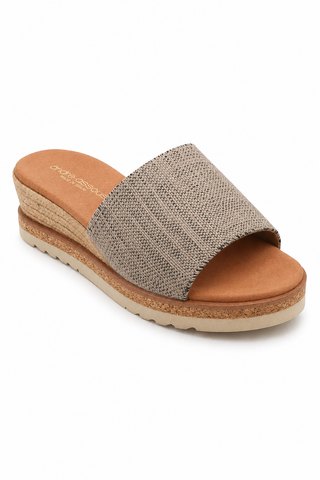 Andre Assous linen wedge sandals with beige linen upper and cork midsole, showcasing luxury and modern design for women.