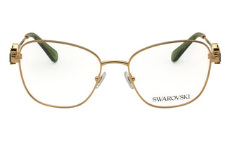 Swarovski 0SK1025 women's cat-eye eyeglasses featuring a gold metal frame and green temple tips.