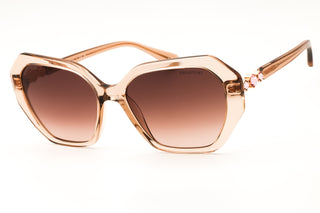 Swarovski SK6017 oversized women's sunglasses in translucent peach acetate with gradient brown lenses and crystal accents.