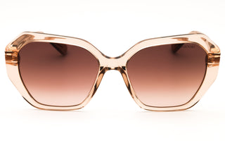Swarovski SK6017 oversized women's sunglasses featuring a translucent peach acetate frame and gradient brown lenses.