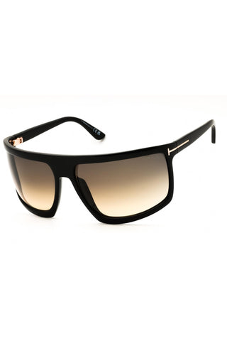 Tom Ford FT1066 oversized black sunglasses with gradient brown lenses and signature gold T-logo temple accents.