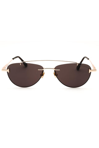 Tom Ford FT1356 unisex aviator sunglasses featuring a gold metal frame and dark rimless lenses on a white background.