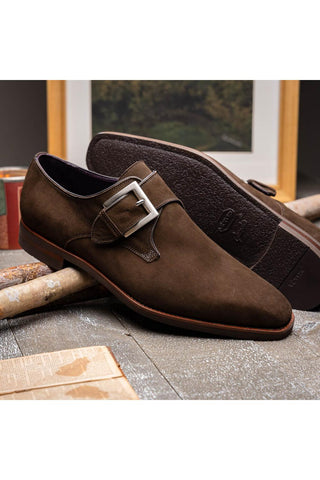 Dark brown suede Zelli Italia single monk-strap shoe with silver buckle and rubber sole.
